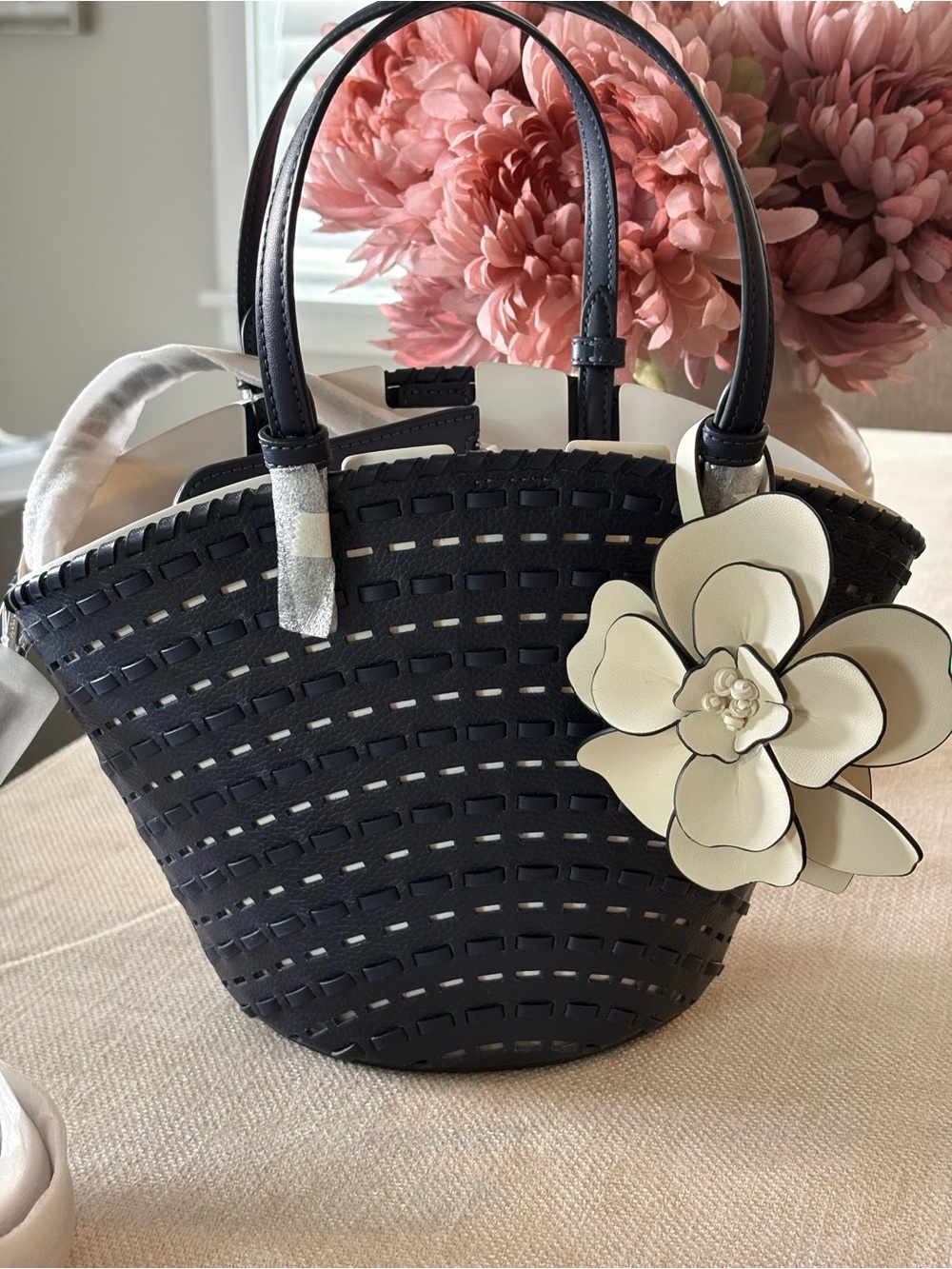 kate spade Black Woven Shoulder Bag with Cream Flower Charm